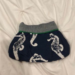 Whimsical seahorse clutch.